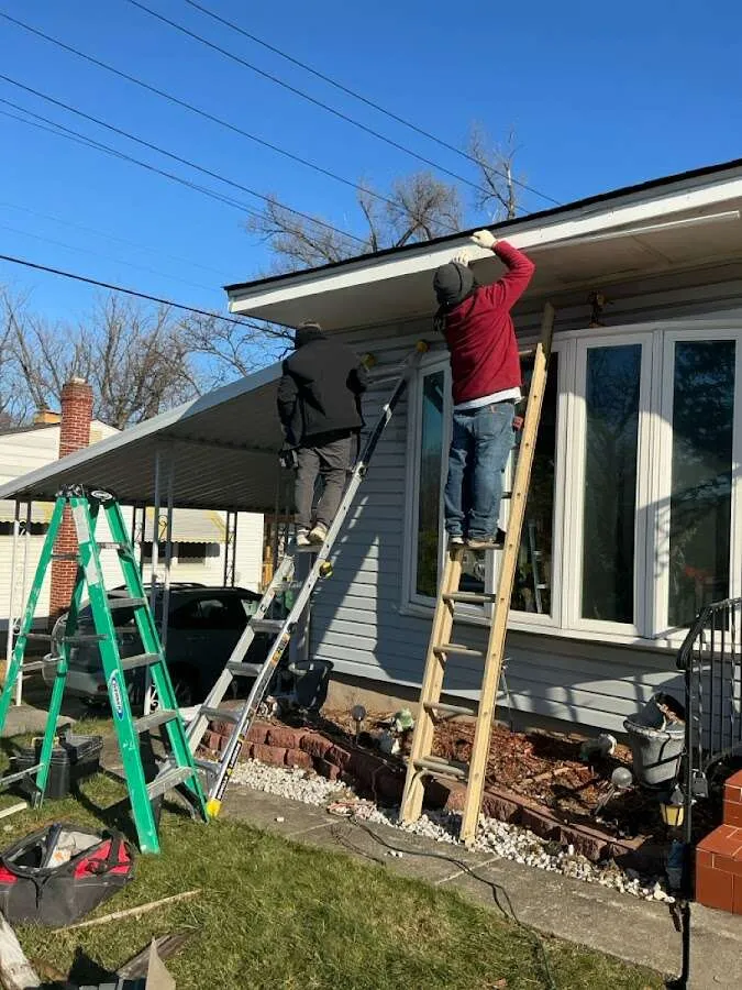 Restoration crew performing exterior repair in Fulton