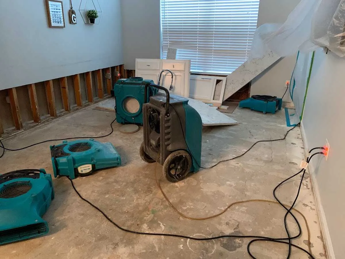 Dehumidifier in flood-cut room for Water Damage Restoration in Fulton